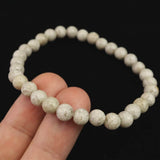 Japanese Natural Ninigi Quartz 6mm Bead Bracelet 10.1g (ID:27465)