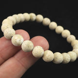 Japanese Natural Yellow Tatsuyama Tuff 8mm Bead Bracelet 16.2g (ID:60244)
